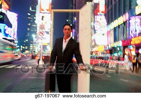 Businessman at Times Square. New York City. USA View Large Photo Image Stock Photo - Businessman at Times Square. New York City. USA. Fotosearch
