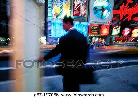 Businessman at Times Square. New York City. USA View Large Photo Image Stock Photograph - Businessman at Times Square. New York City. USA. Fotosearch