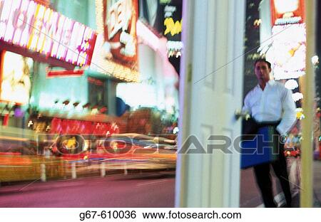 Businessman at Times Square. New York City. USA View Large Photo Image Stock Photograph - Businessman at Times Square. New York City. USA. Fotosearch