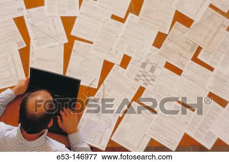 Stock Photo - Businessman at work. Fotosearch
