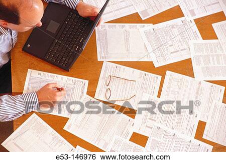 Businessman at work View Large Photo Image Stock Photograph - Businessman at work. Fotosearch