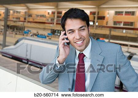 Businessman. AVE, Tren Alta Velocidad. Delicias station, Zaragoza, Arag? n. Spain. View Large Photo Image Picture - Businessman. AVE, Tren Alta Velocidad. Delicias station, Zaragoza, Arag? n. Spain.. Fotosearch