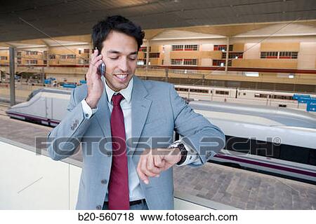 Businessman. AVE, Tren Alta Velocidad. Delicias station, Zaragoza, Arag? n. Spain. View Large Photo Image Stock Photo - Businessman. AVE, Tren Alta Velocidad. Delicias station, Zaragoza, Arag? n. Spain.. Fotosearch