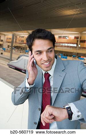 Businessman. AVE, Tren Alta Velocidad. Delicias station, Zaragoza, Arag? n. Spain. View Large Photo Image Stock Photo - Businessman. AVE, Tren Alta Velocidad. Delicias station, Zaragoza, Arag? n. Spain.. Fotosearch