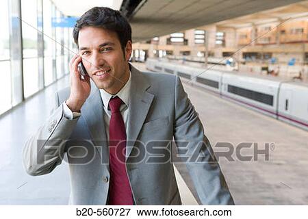 Businessman. AVE, Tren Alta Velocidad. Delicias station, Zaragoza, Arag? n. Spain. View Large Photo Image Stock Photo - Businessman. AVE, Tren Alta Velocidad. Delicias station, Zaragoza, Arag? n. Spain.. Fotosearch
