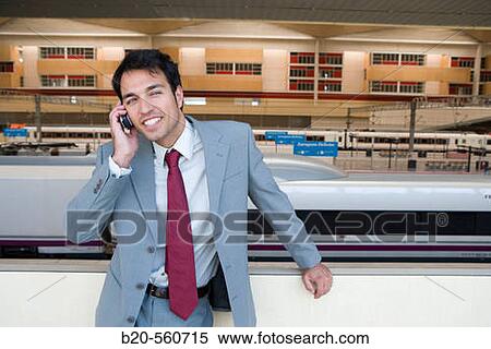 Businessman. AVE, Tren Alta Velocidad. Delicias station, Zaragoza, Arag? n. Spain. View Large Photo Image Stock Photography - Businessman. AVE, Tren Alta Velocidad. Delicias station, Zaragoza, Arag? n. Spain.. Fotosearch