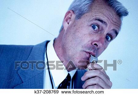 Stock Photo - Businessman blowing the whistle on bad deals. Fotosearch