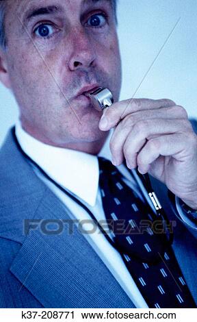 Stock Image - Businessman blowing the whistleon bad deals. Fotosearch