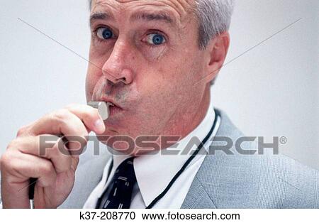 Businessman blowing whistle View Large Photo Image Stock Image - Businessman blowing whistle. Fotosearch