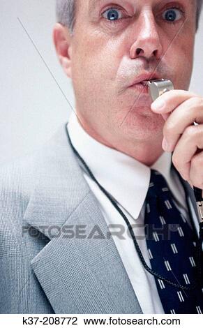Businessman blowing whistle View Large Photo Image Stock Image - Businessman blowing whistle. Fotosearch