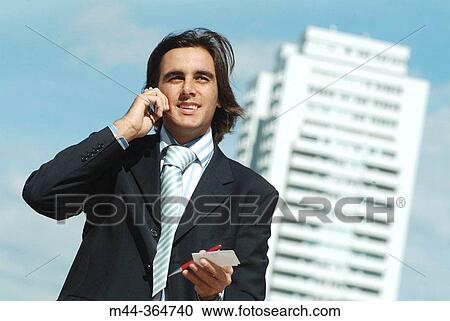 Stock Image - Businessman. Ciudad de las Artes y las Ciencias. Valencia. Spain.. Fotosearch