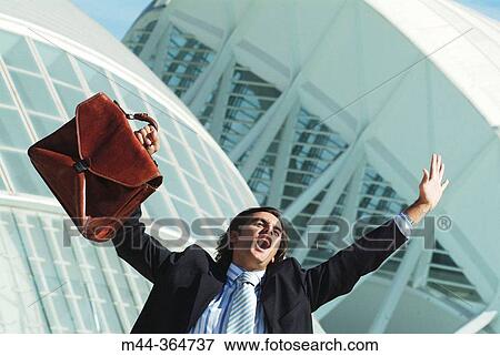 Stock Photo - Businessman. Ciudad de las Artes y las Ciencias. Valencia. Spain.. Fotosearch