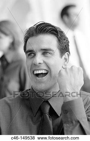 Businessman clenching fist View Large Photo Image Stock Photo - Businessman clenching fist. Fotosearch