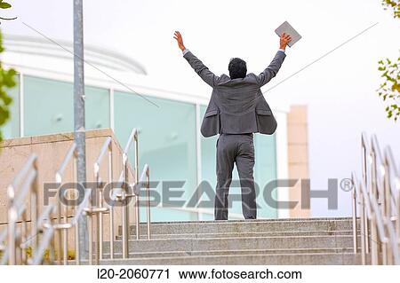 Businessman climbing stairs. San Sebastian Technology Park. Donostia. Gipuzkoa. Basque Country. Spain. View Large Photo Image Stock Image - Businessman climbing stairs. San Sebastian Technology Park. Donostia. Gipuzkoa. Basque Country. Spain.. Fotosearch