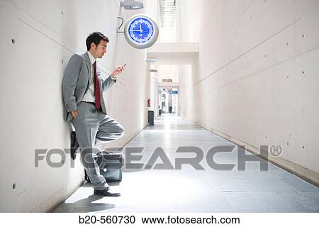Businessman. Delicias station, Zaragoza, Arag? n. Spain. View Large Photo Image Stock Image - Businessman. Delicias station, Zaragoza, Arag? n. Spain.. Fotosearch