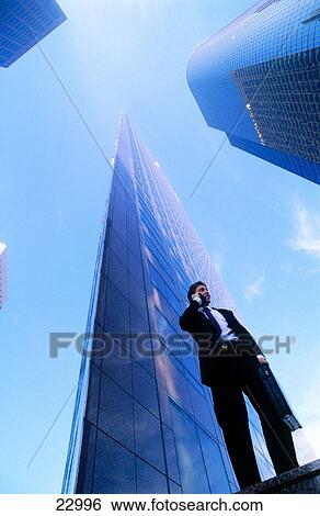 Businessman downtown View Large Photo Image Stock Photograph - Businessman downtown. Fotosearch