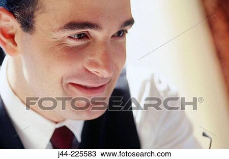 Businessman face smiling View Large Photo Image Stock Image - Businessman face smiling. Fotosearch