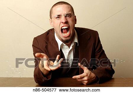Stock Photo - Businessman gesturing excitedly: anger, frustration. Fotosearch