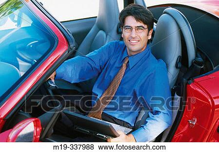 businessman in a car View Large Photo Image Stock Photo - businessman in a car. Fotosearch