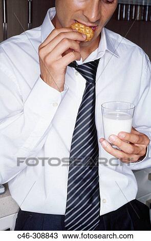 Businessman in the kitchen View Large Photo Image Stock Image - Businessman in the kitchen. Fotosearch