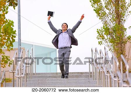 Businessman jumping stairs. San Sebastian Technology Park. Donostia. Gipuzkoa. Basque Country. Spain. View Large Photo Image Stock Image - Businessman jumping stairs. San Sebastian Technology Park. Donostia. Gipuzkoa. Basque Country. Spain.. Fotosearch