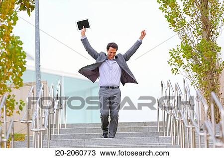 Businessman jumping stairs. San Sebastian Technology Park. Donostia. Gipuzkoa. Basque Country. Spain. View Large Photo Image Stock Image - Businessman jumping stairs. San Sebastian Technology Park. Donostia. Gipuzkoa. Basque Country. Spain.. Fotosearch