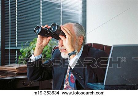 businessman looking out with binoculars View Large Photo Image Picture - businessman looking out with binoculars. Fotosearch