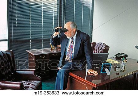 businessman looking out with binoculars View Large Photo Image Stock Image - businessman looking out with binoculars. Fotosearch