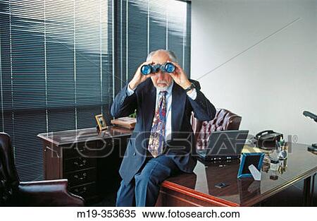 Stock Photography - businessman looking out with binoculars. Fotosearch