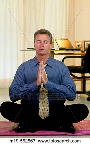 businessman meditaing View Large Photo Image Stock Photo - businessman meditaing. Fotosearch