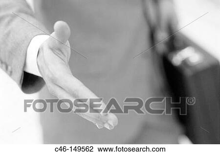 Businessman offering his hand View Large Photo Image Stock Image - Businessman offering his hand. Fotosearch