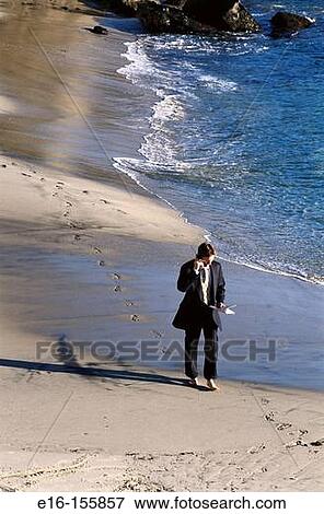 Businessman on beach View Large Photo Image Stock Photo - Businessman on beach. Fotosearch