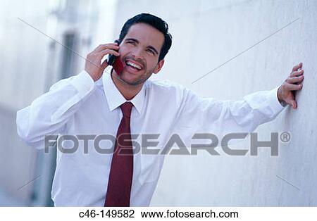 Businessman on cell phone View Large Photo Image Stock Image - Businessman on cell phone. Fotosearch