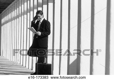 Businessman on cell phone View Large Photo Image Stock Image - Businessman on cell phone. Fotosearch
