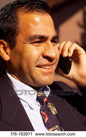 Businessman on cell phone View Large Photo Image Stock Image - Businessman on cell phone. Fotosearch