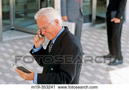 businessman on cellular View Large Photo Image Stock Image - businessman on cellular. Fotosearch