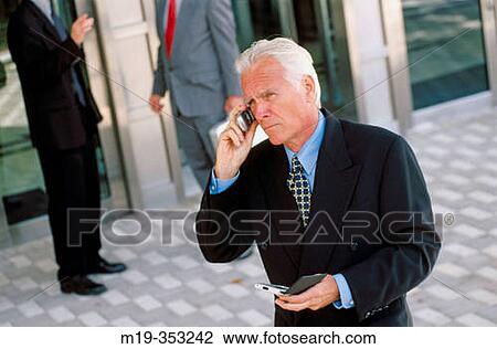 businessman on cellular View Large Photo Image Stock Image - businessman on cellular. Fotosearch