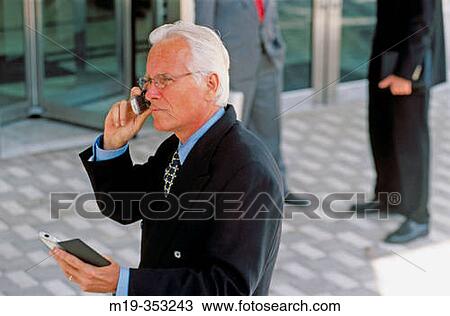 businessman on cellular View Large Photo Image Stock Image - businessman on cellular. Fotosearch