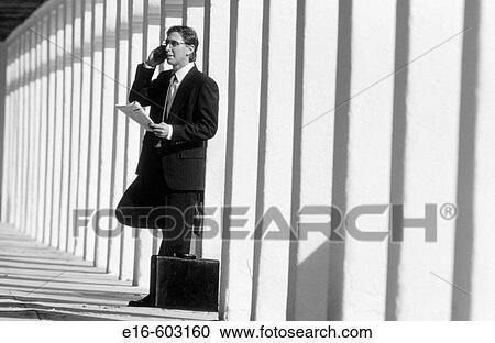 Businessman on phone View Large Photo Image Stock Image - Businessman on phone. Fotosearch