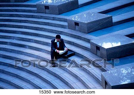 Businessman on steps View Large Photo Image Stock Image - Businessman on steps. Fotosearch