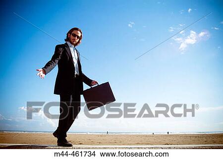 Businessman on the beach View Large Photo Image Picture - Businessman on the beach. Fotosearch