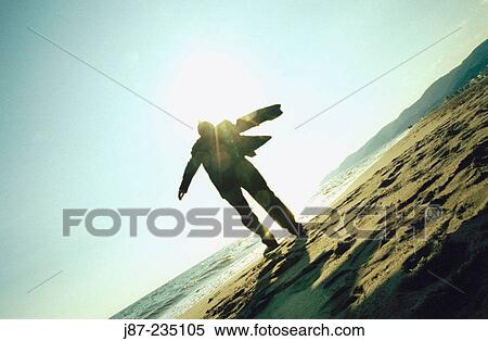 Businessman on the beach View Large Photo Image Stock Photography - Businessman on the beach. Fotosearch