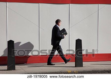 Businessman on the street in Holborn, London, England. View Large Photo Image Stock Photography - Businessman on the street in Holborn, London, England.. Fotosearch