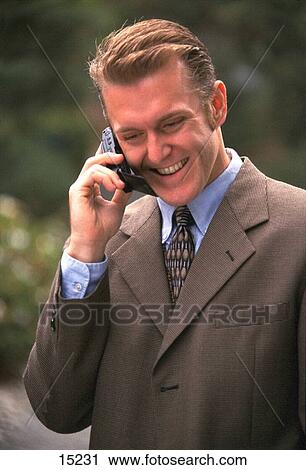 Businessman outdoors on cell phone View Large Photo Image Stock Image - Businessman outdoors on cell phone. Fotosearch