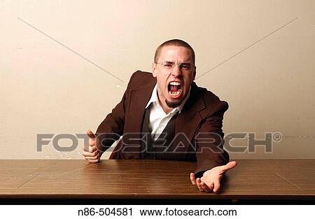 Businessman reaching out over table View Large Photo Image Stock Image - Businessman reaching out over table. Fotosearch