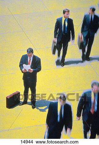 Picture - Businessman reading newspaper. Fotosearch