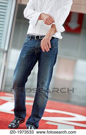 Businessman rolling up sleeves, Business, Donostia, San Sebastian, Basque Country, Spain. View Large Photo Image Stock Image - Businessman rolling up sleeves, Business, Donostia, San Sebastian, Basque Country, Spain.. Fotosearch