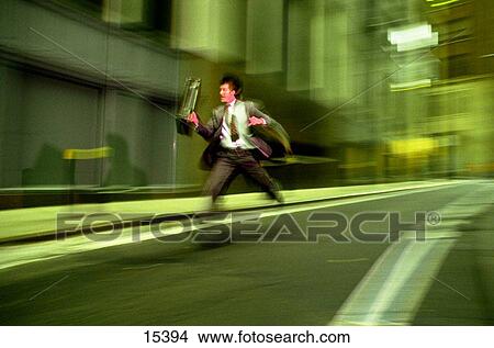 Businessman running View Large Photo Image Picture - Businessman running. Fotosearch