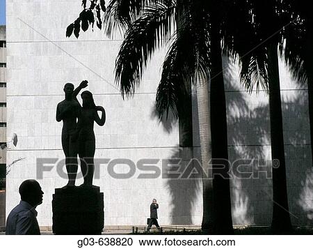 Businessman talking in cell phone while walking in the street, downtown Rio de Janeiro, Brazil. View Large Photo Image Stock Image - Businessman talking in cell phone while walking in the street, downtown Rio de Janeiro, Brazil.. Fotosearch