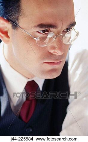Businessman with glasses View Large Photo Image Picture - Businessman with glasses. Fotosearch